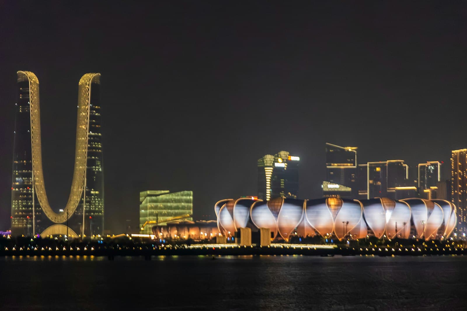 Hangzhou skyline reflected in the water at night