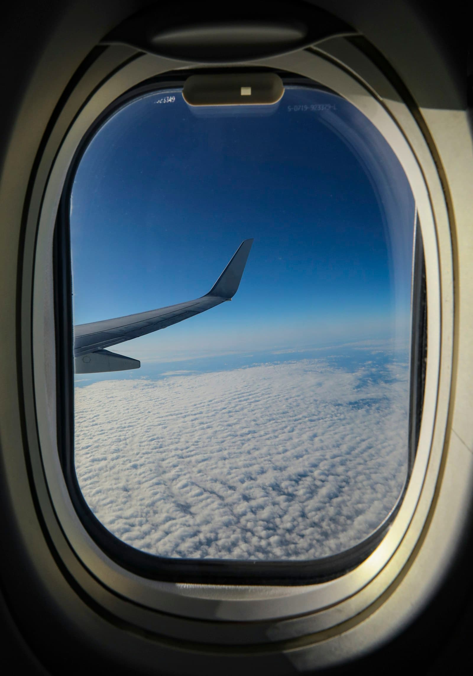 Clouds seen through an aircraft window